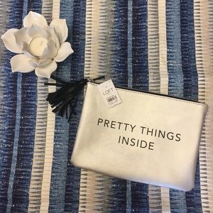 NWT Loft silver zipper bag with tassel